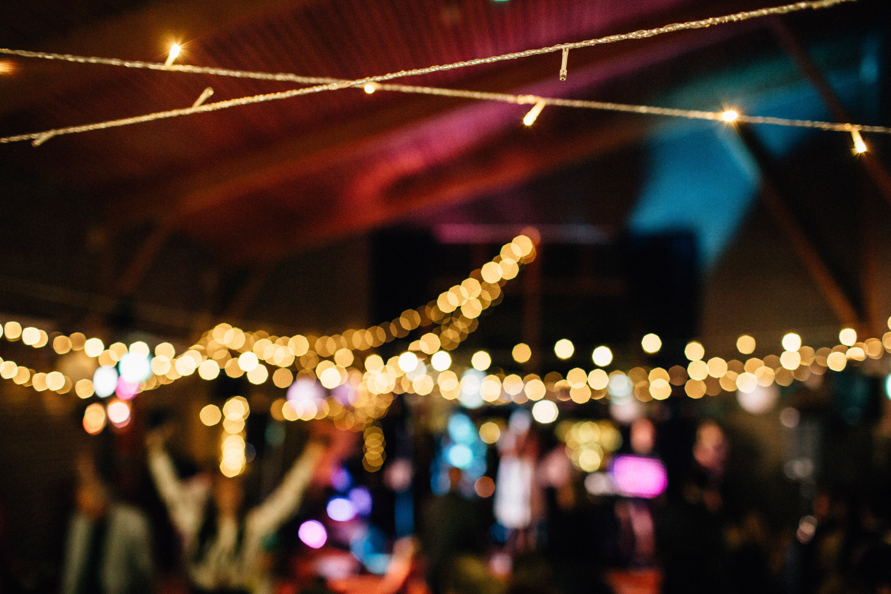 quirky fun autumn wedding in london wedding photographer documentary style first dance fairy lights decoration