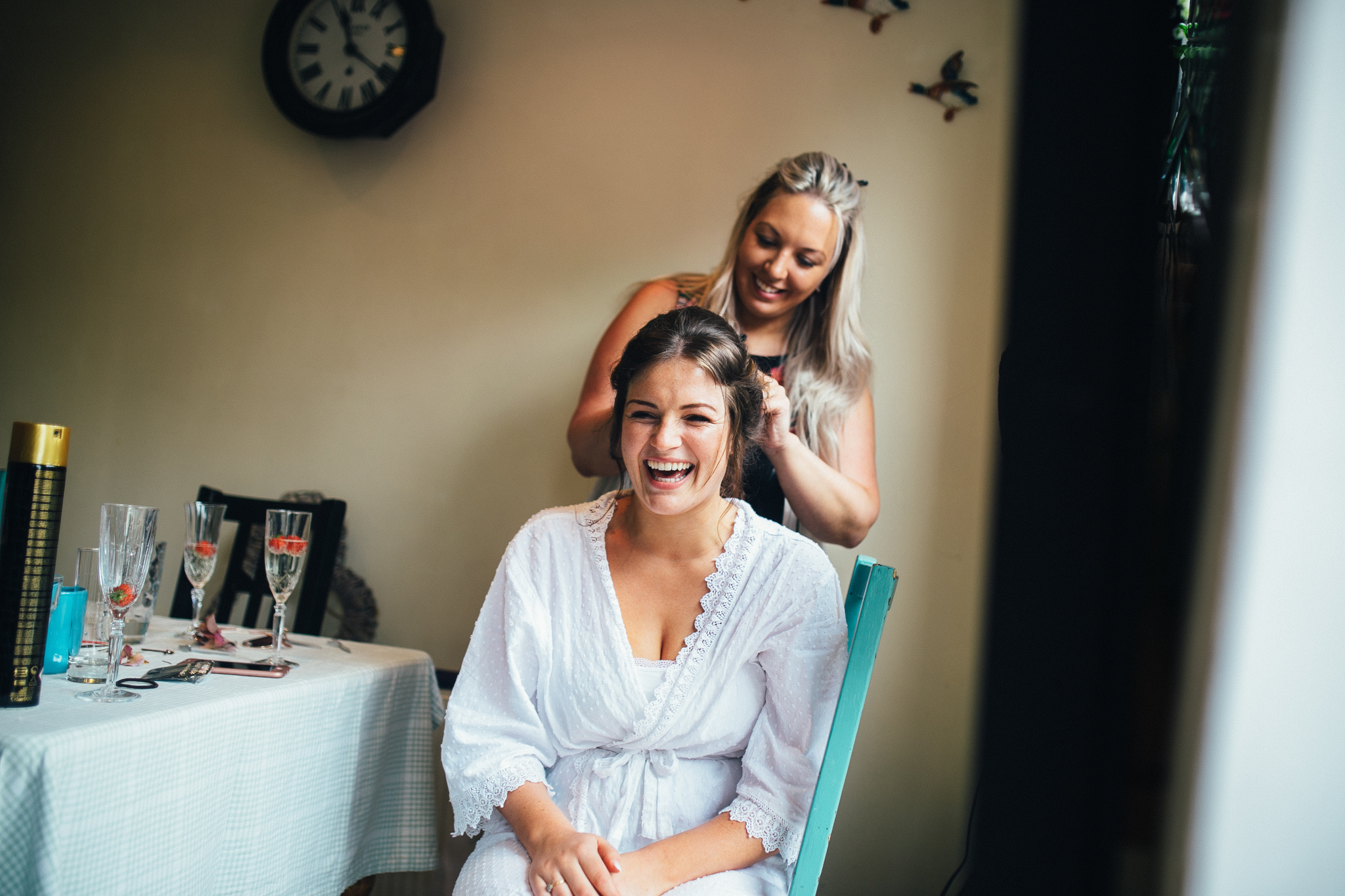 colorful rustic and vintage tipi wedding photography in surrey bridesmaids at bridal prep matching pajamas