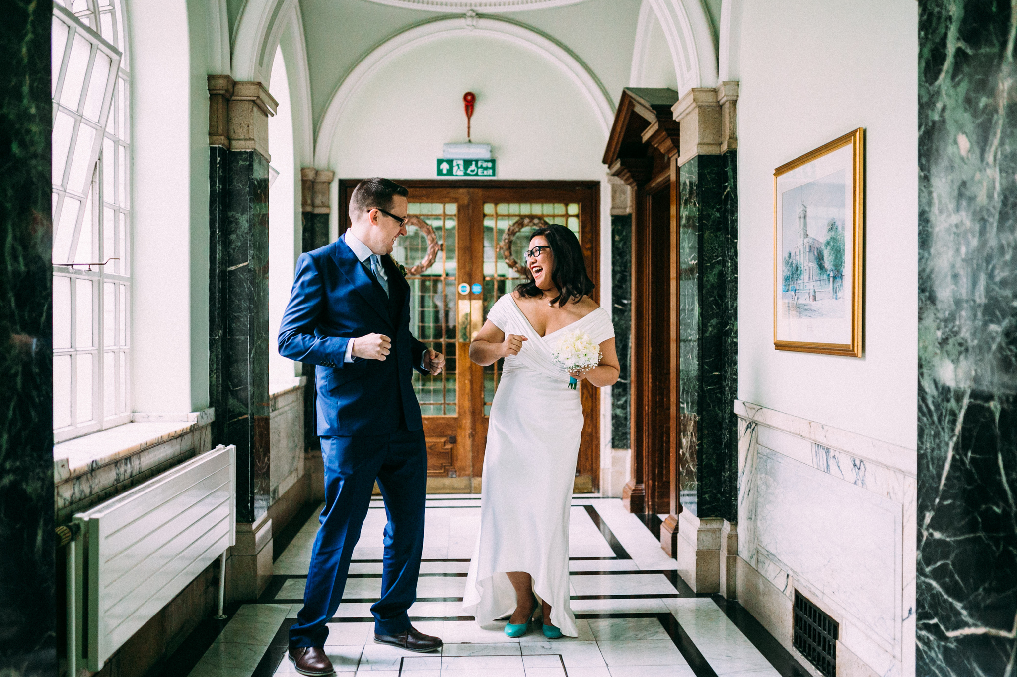wedding photographer in london islington town hall - first look between bride and groom ceremony photos