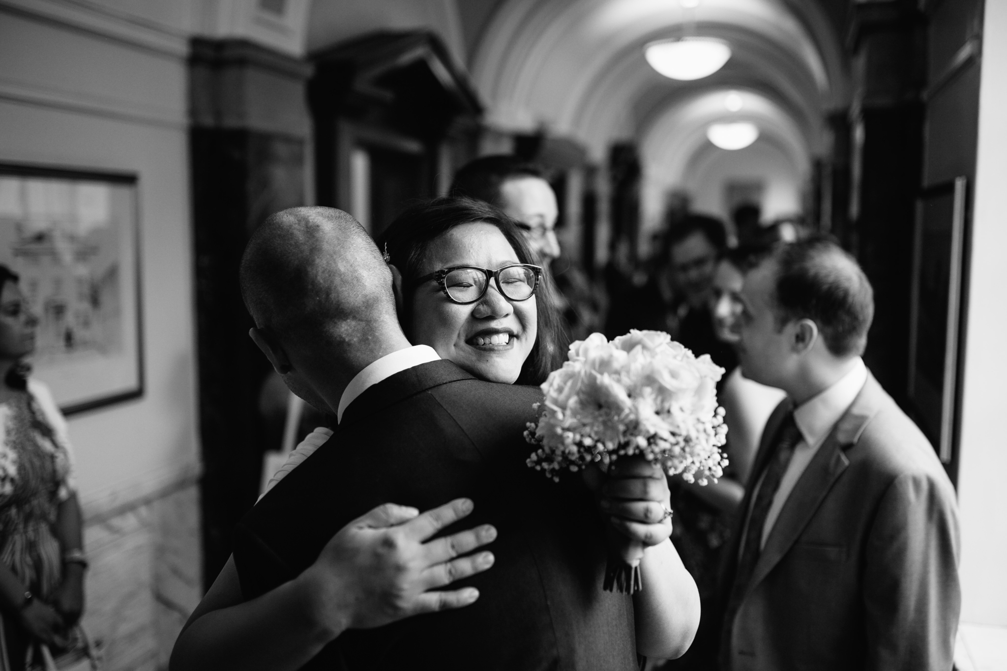 wedding photographer in london islington town hall - first look between bride and groom ceremony photos