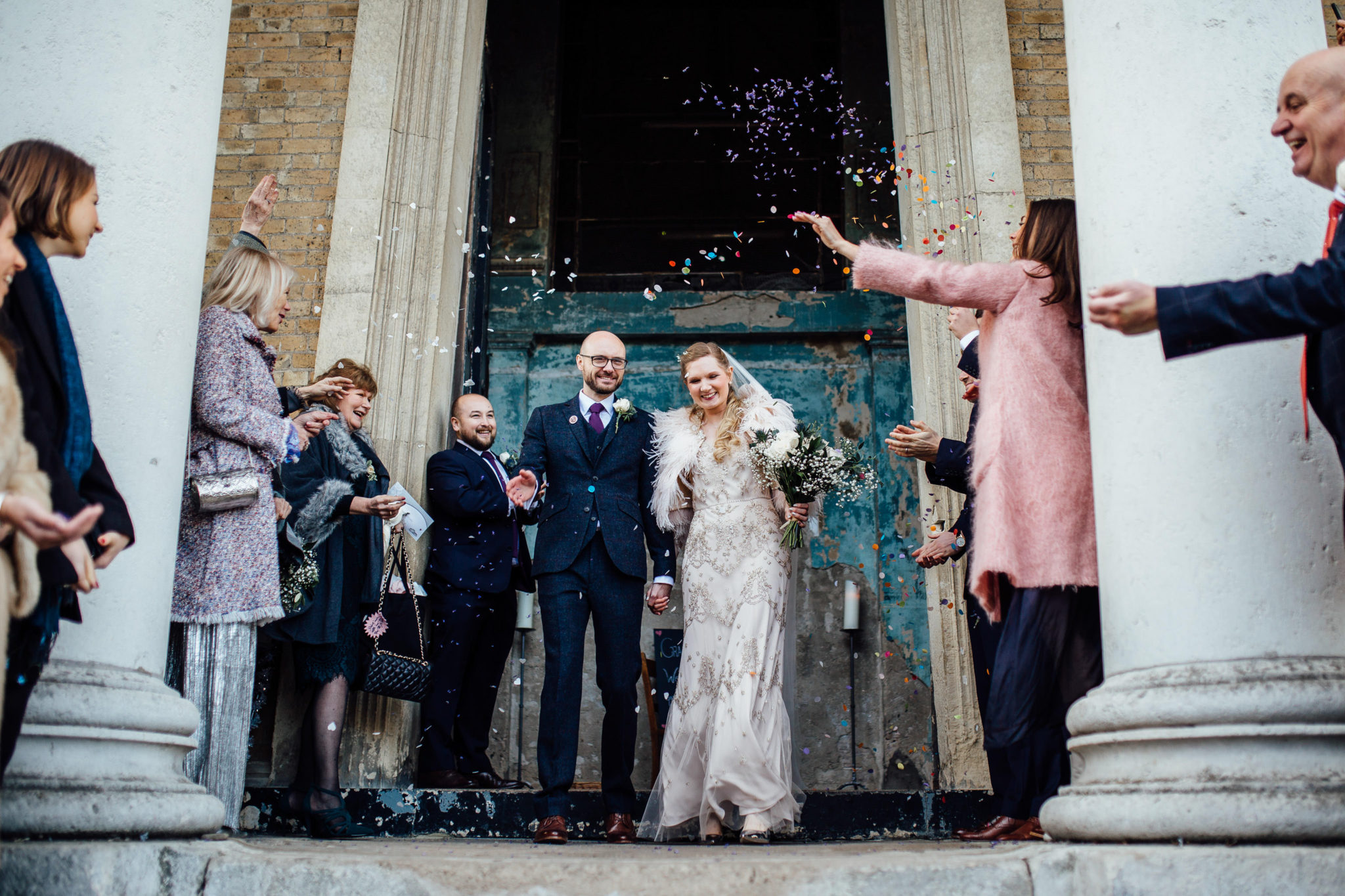 CONFETTI OUTSIDE CEREMONY AT THE ASYLUM LONDON WEDDING PHOTOGRAPHY