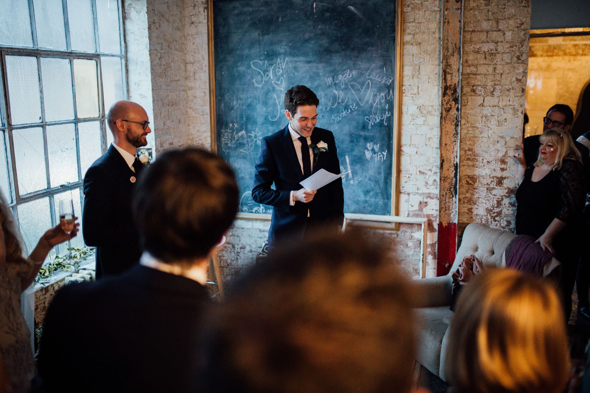CANDIDS AT WAREHOUSE WEDDING AT ONE FRIENDLY PLACE LONDON DOCUMENTARY FUN WEDDING PHOTOGRAPHY