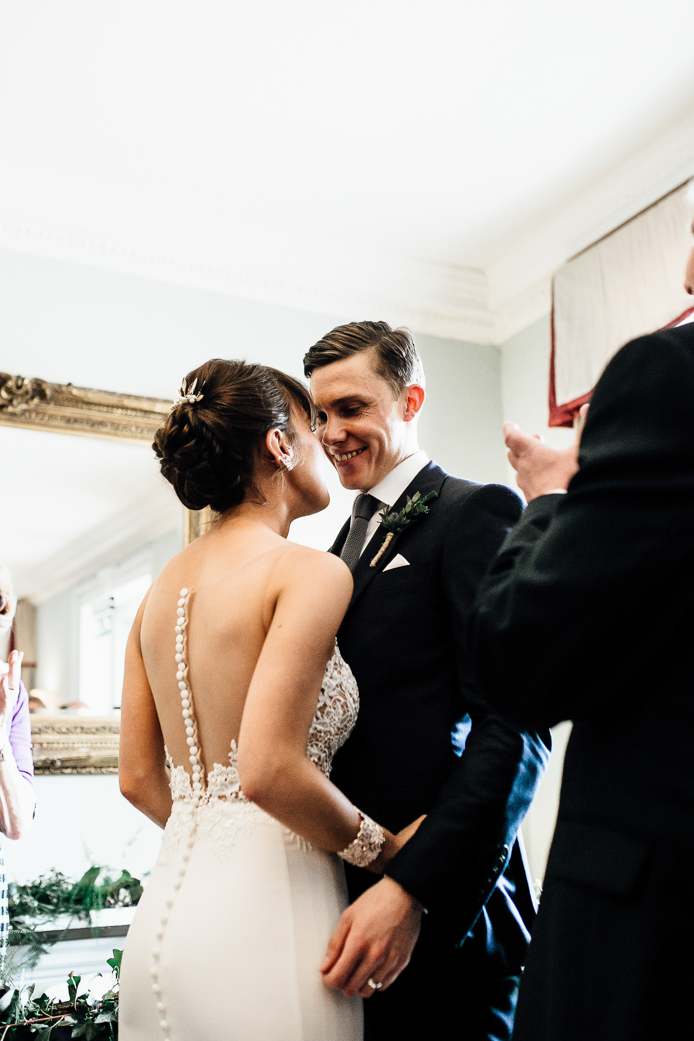 ceremony at morden hall wedding botanical theme with geometrical copper details